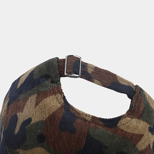 Detail of camouflage corduroy baseball cap with adjustable metal buckle and strap