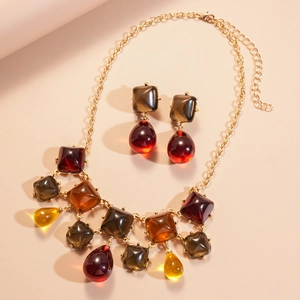 Parure de bijoux chic avec collier et boucles d'oreilles en résine géométrique pour femme