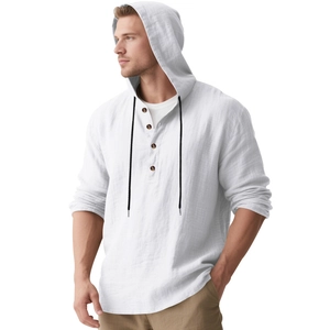 Detail of white linen hoodie shirt showing textured fabric and black drawstring accents