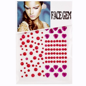 Detail showing heart-shaped red and purple face gems with self-adhesive backing