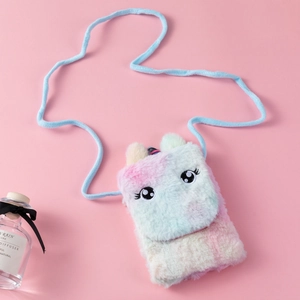 Detailed close-up of soft unicorn plush bag featuring pastel gradient and embroidery
