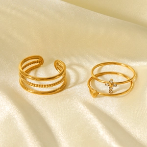 Gold stainless steel ring set with layered beads, cross zircon and heart pendant on silk