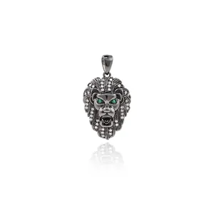 Macro detail of lion head pendant with cubic zirconia eyes and pave set stones