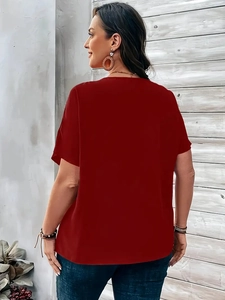 Back view of women's loose V-neck short sleeve red shirt top with elegant casual fit