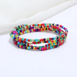 Macro detail of colorful double-layered beaded chain for waist or beach bikini style