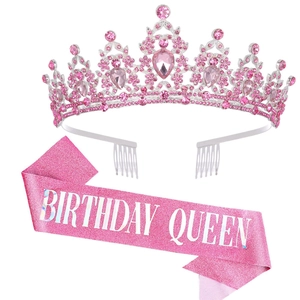 Close-up of pink crystal birthday queen tiara and pink glitter sash set for party