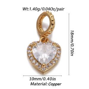 Detail view of heart zircon charm with measurements 18mm by 10mm in gold plated copper