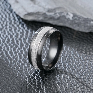 Men's matte black titanium steel ring with silver sandblasted center on leather
