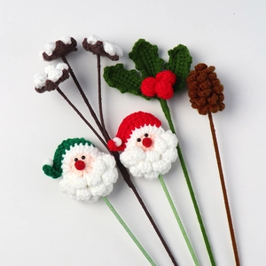 Handcrafted crochet Christmas bouquet featuring Santa Claus, pine cones, and cotton stems