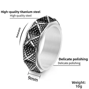 Detail eines 9 mm breiten Vintage-Edelstahl-Spinners mit schwarzem Kreuz-Reliefmuster