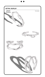 Macro detail of S925 sterling silver ring showing irregular wave texture and hallmarks