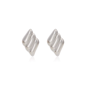 Detail of silver textured geometric earrings with polished mirror finish and ridge patterns