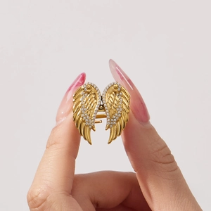 Exquisite gold stainless steel wing ring with tiny cubic zirconia stones for women