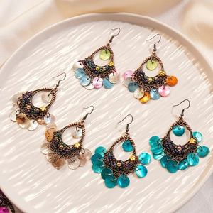 Bohemian retro bronze drop earrings with colorful shell sequins and bead details