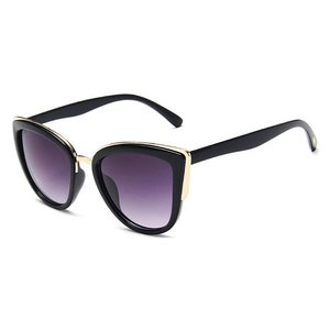 Chic cat eye sunglasses with black frame, gold metal accents and purple gradient lenses