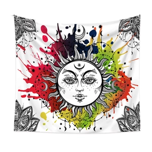 Detail of bohemian sun and moon tapestry with vibrant ink-splash pattern and mandala art