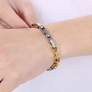 Close-up of gold and silver mixed industrial style 8mm square chain stainless steel bracelet