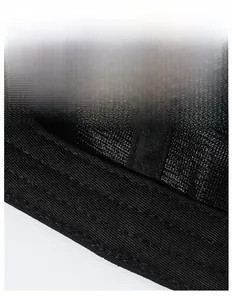 Detail of the widened sweatband featuring breathable mesh texture on a black sports hat