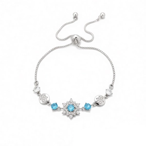 Elegant silver snowflake bolo bracelet with blue zircon stones and adjustable slider clasp