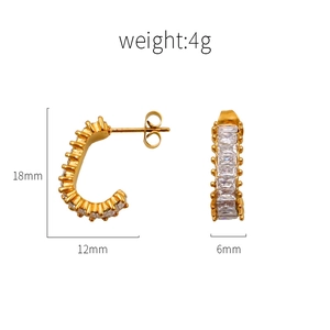 Gold-plated C-shaped stud earrings with baguette-cut zircon stones on a white background