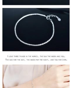 Detailed view of 925 sterling silver minimalist chain bracelet worn on female wrist