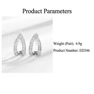 Luxurious geometric silver drop earrings with baguette cubic zirconia, 20.4mm by 12.7mm