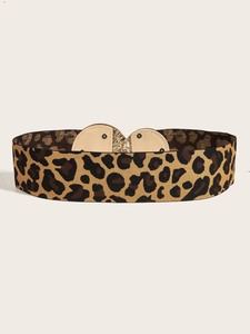 Detail of leopard print wide elastic waist belt with symmetric metal buckle for dresses