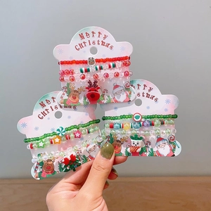 Three-piece Christmas beaded bracelet set with Santa and reindeer charms for kids