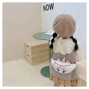 Rear view of unicorn sequin waist bag for kids with rainbow ears and pink strap