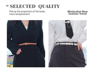 Slim leather belt with silver buckle shown on black blazer and grey trousers