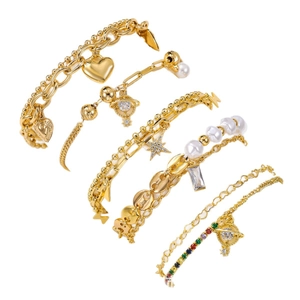 5-piece gold bracelet set with heart pendant, Saturn charm, pearls and layered chains