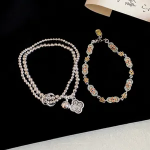 Silver flower bracelets with enamel petals and double-layer beaded chain for women