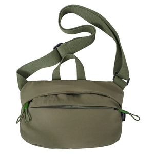 Front detail of army green nylon crossbody bag showing zip pocket and adjustable strap