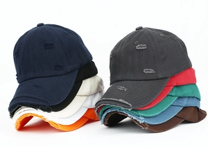 Distressed cotton baseball cap with ripped details shown in multiple colors on white background