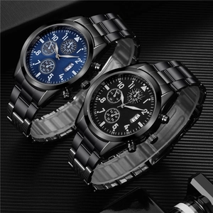 Detail view of multifunctional business watch showing dual chronograph dials and date window