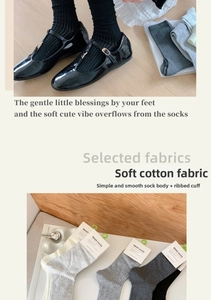 Detail showing soft cotton texture and frill cuffs on mid-calf socks in diverse colors