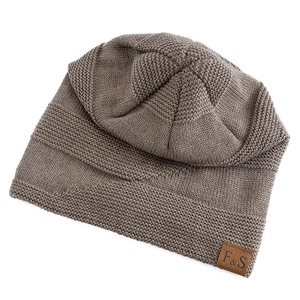 Detailed close-up of taupe knit beanie with textured patterns and F&S leather label