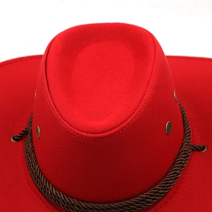 Top view of red suede cowboy hat with braided brown band and brass ventilation eyelets