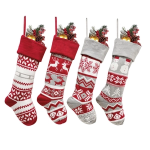 Set of 4 knitted Christmas stockings featuring reindeer and snowflake patterns
