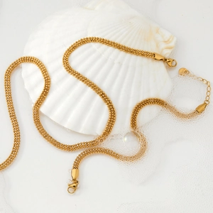 Elegant gold multi-row bead chain necklace in stainless steel with shell decoration