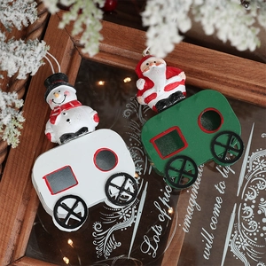 Christmas train ornaments with Santa and Snowman figures for festive holiday decoration