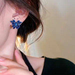 Exquisite blue zircon butterfly stud earrings for women with a sparkling crystal wing design