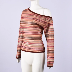 Detail of warm-toned striped knit long sleeve top with off-shoulder neckline design