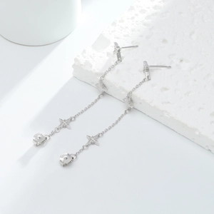 Close-up of S925 sterling silver star stud earrings with long elegant chain tassels
