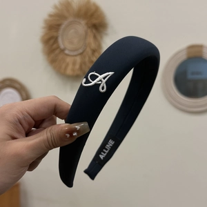 Classic black padded fabric headband with letter A embroidery for autumn and winter fashion