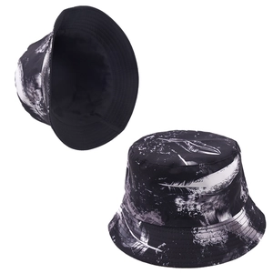 Detailed close-up showing the interior black lining and ink-wash print pattern of the bucket hat