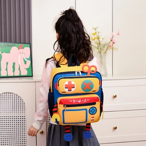 Robot-themed kids backpack with colorful gears and multi-pocket design on school model