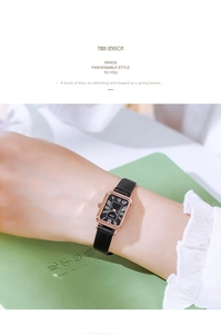 Close-up of GEDI vintage rectangular quartz watch with rose gold case and black leather strap