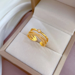Three-layer gold-plated adjustable ring with brilliant center stone and micro-pavé details