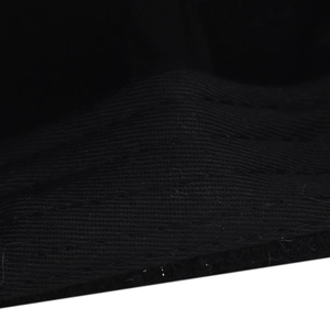 Detailed macro shot showing the fine texture and stitching of the black glitter baseball cap